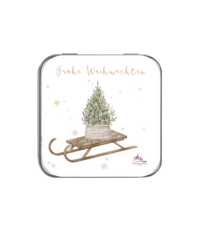 Weihnachtliche Dose mit Alkohol