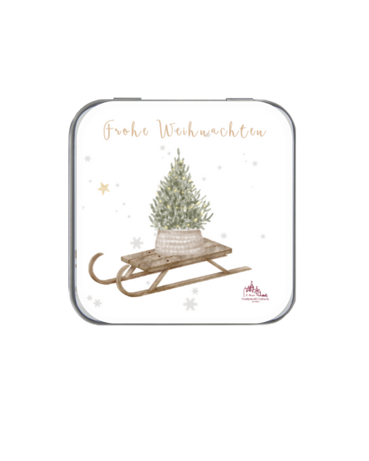 Weihnachtliche Dose mit Alkohol